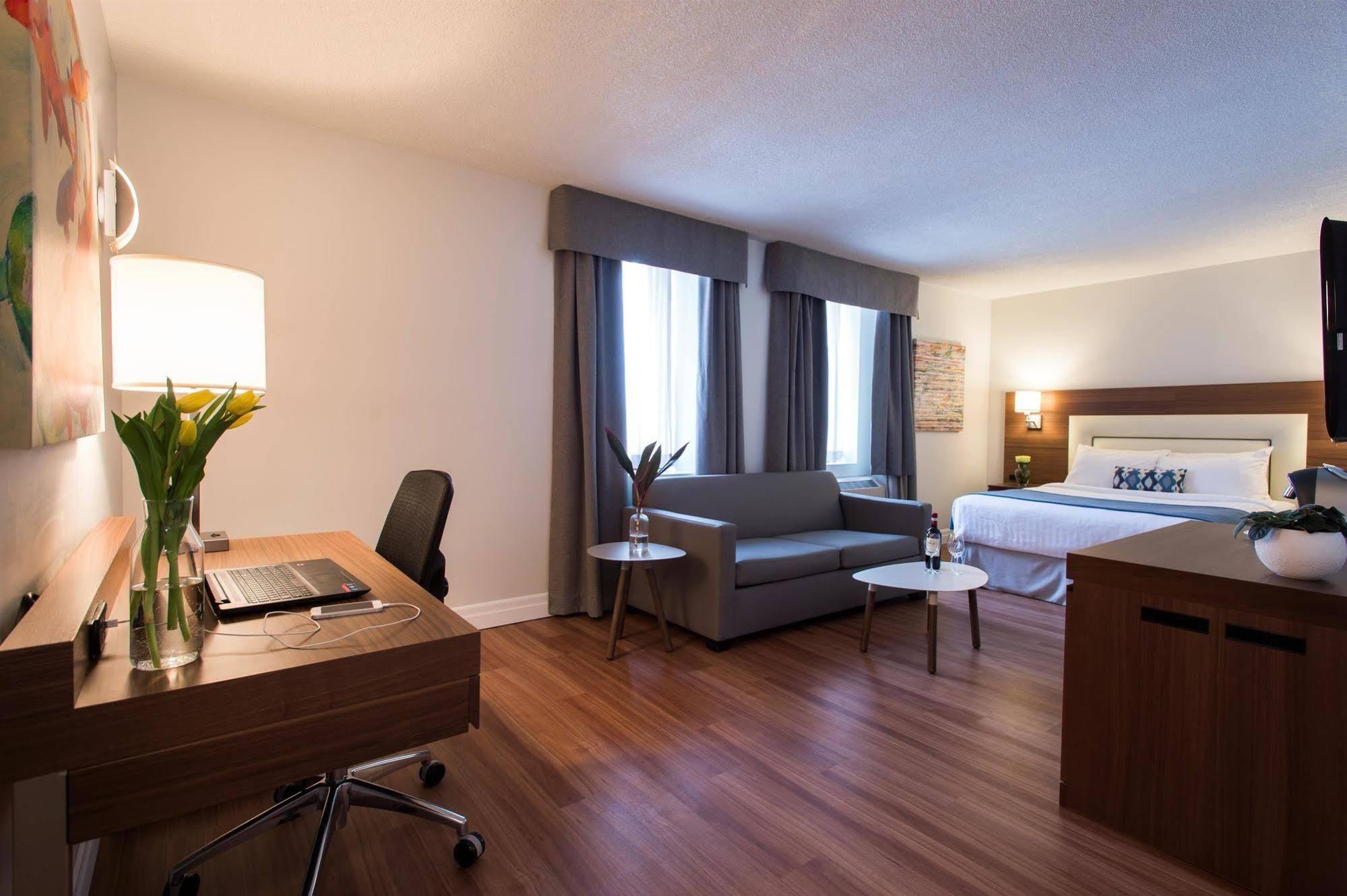 Hotel Albert Par G5 Rouyn Bagian luar foto